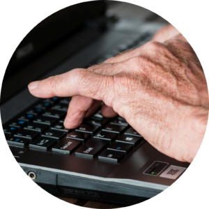 Hands typing on keyboard